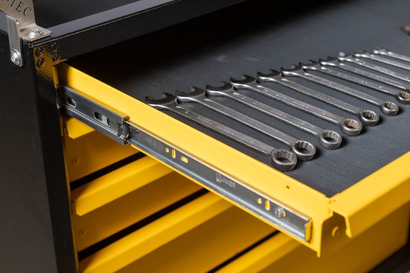 Open workshop trolley drawer with organised hand tools
